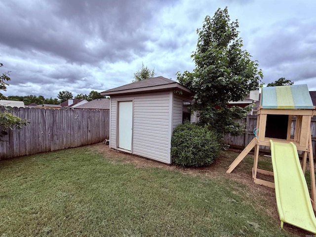 7 Butterfly Dr, Sherwood, AR 72120 - view of shed with a playground
