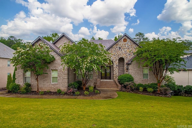 1517 Wetherborne Dr, Little Rock, AR 72211 - view of front facade featuring a front lawn and stone siding