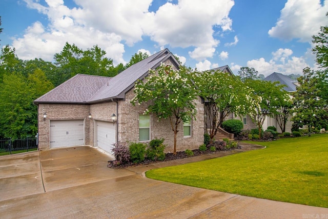 1517 Wetherborne Dr, Little Rock, AR 72211 - view of front facade featuring a front lawn, driveway, a garage, brick siding, and roof with shingles