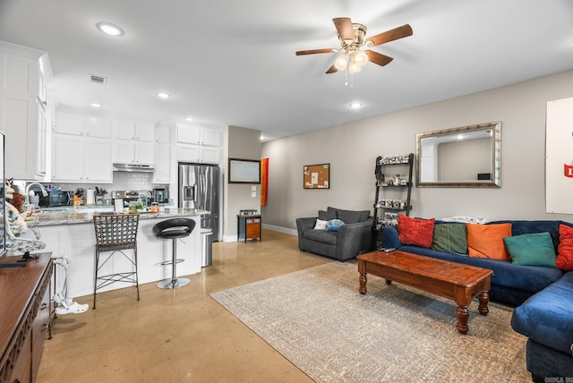 1 Park St Unit A & B, Mayflower, AR 72106 - living room featuring concrete flooring, ceiling fan, recessed lighting, and baseboards