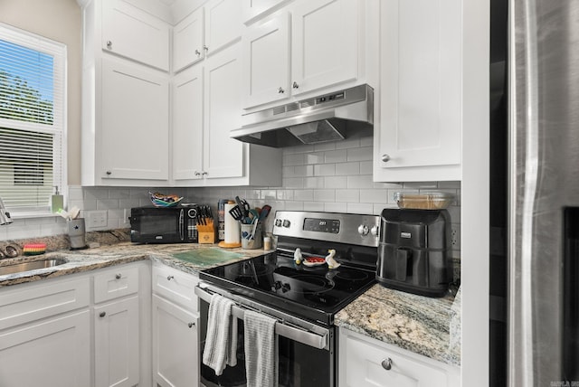 1 Park St Unit A & B, Mayflower, AR 72106 - kitchen with appliances with stainless steel finishes, under cabinet range hood, a sink, white cabinets, and backsplash