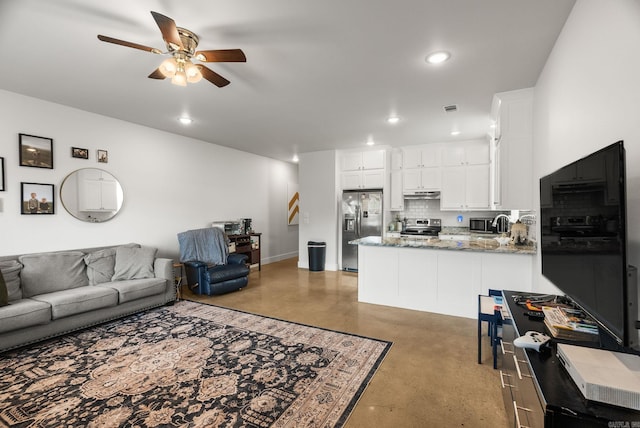 1 Park St Unit A & B, Mayflower, AR 72106 - living area with ceiling fan, concrete flooring, recessed lighting, and baseboards