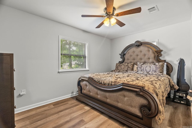 30 Center St Unit A & B, Mayflower, AR 72106 - bedroom featuring wood finished floors, baseboards, and ceiling fan