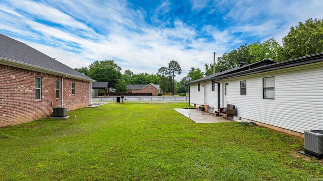 30 Center St Unit A & B, Mayflower, AR 72106 - view of yard featuring a patio and central AC unit