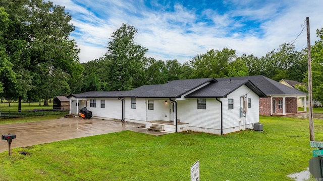 30 Center St Unit A & B, Mayflower, AR 72106 - back of house with crawl space, central AC, and concrete driveway