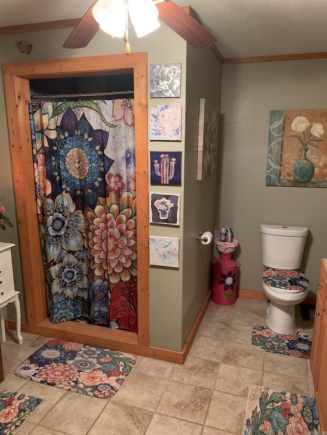 160 Ouachita 476, Camden, AR 71701 - bathroom featuring ornamental molding, toilet, a ceiling fan, baseboards, and a shower with shower curtain