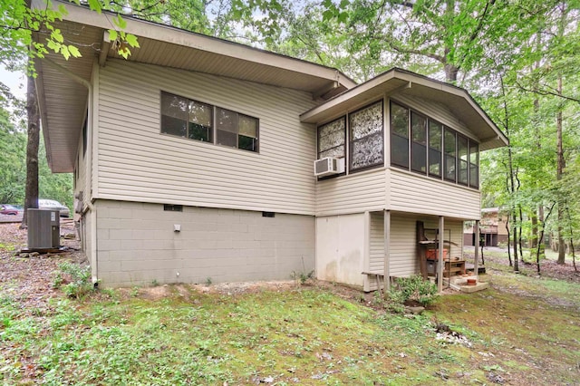 23 Valls Ln, Hot Springs, AR 71909 - rear view of property with central AC, a sunroom, crawl space, and cooling unit