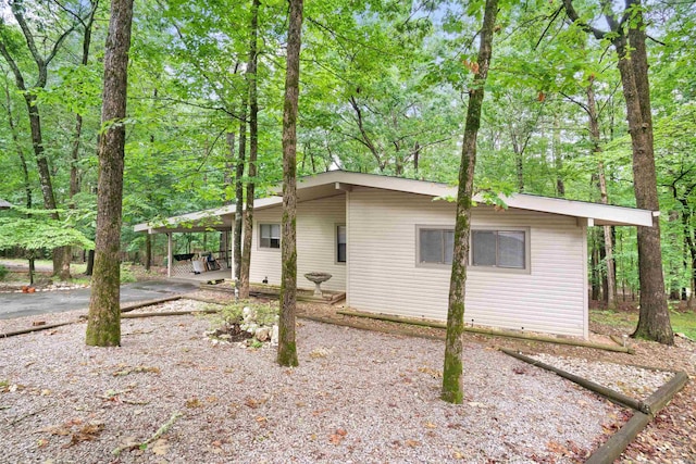 23 Valls Ln, Hot Springs, AR 71909 - view of side of home with an attached carport