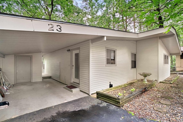23 Valls Ln, Hot Springs, AR 71909 - view of side of property with a carport