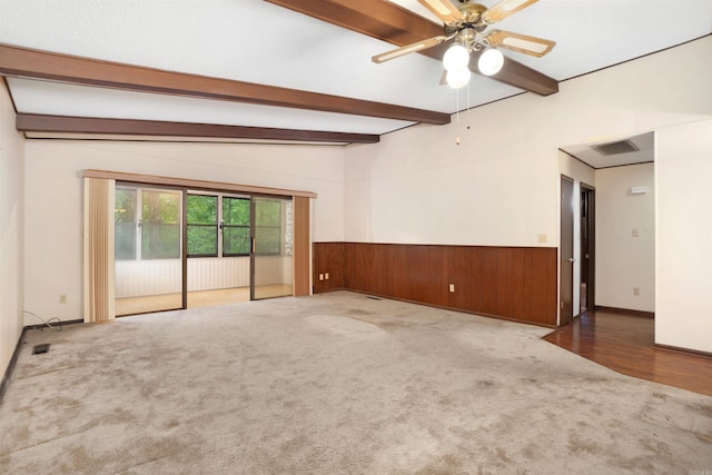 23 Valls Ln, Hot Springs, AR 71909 - carpeted spare room featuring beam ceiling, a wainscoted wall, wood walls, and a ceiling fan