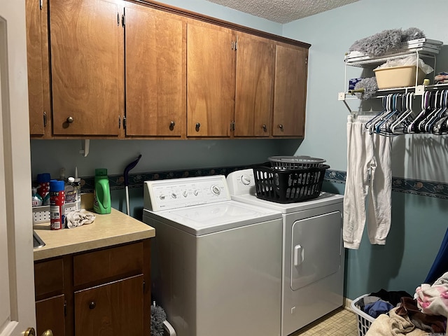 17003 Quail Run Dr, Little Rock, AR 72210 - washroom featuring cabinet space, separate washer and dryer, and a textured ceiling