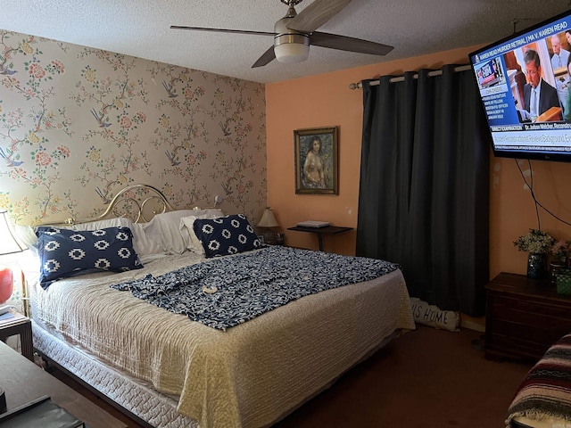 17003 Quail Run Dr, Little Rock, AR 72210 - bedroom featuring a textured ceiling, wallpapered walls, a ceiling fan, and carpet
