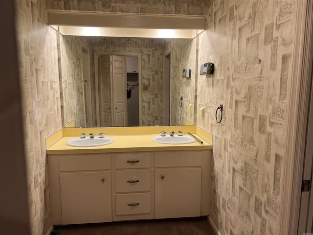 17003 Quail Run Dr, Little Rock, AR 72210 - bathroom featuring wallpapered walls and double vanity