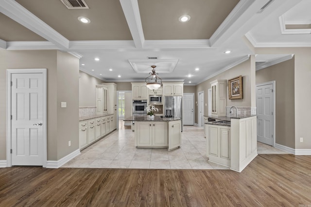 119 Marseille Dr, Maumelle, AR 72113 - kitchen with appliances with stainless steel finishes, light wood-style flooring, decorative backsplash, dark stone countertops, and crown molding