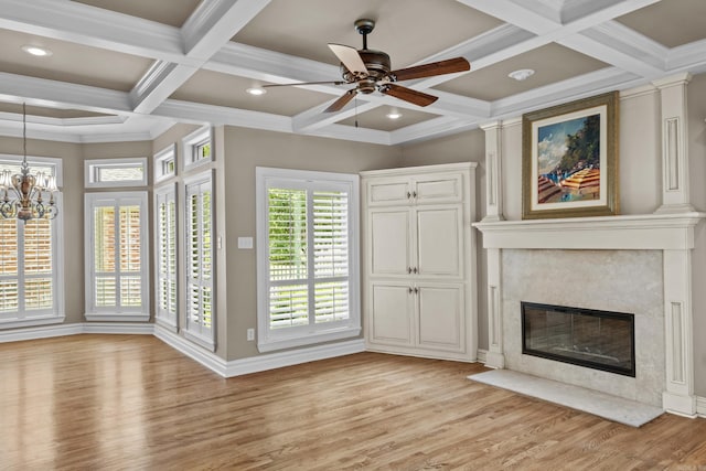 119 Marseille Dr, Maumelle, AR 72113 - unfurnished living room featuring coffered ceiling, light wood finished floors, a ceiling fan, a chandelier, and recessed lighting