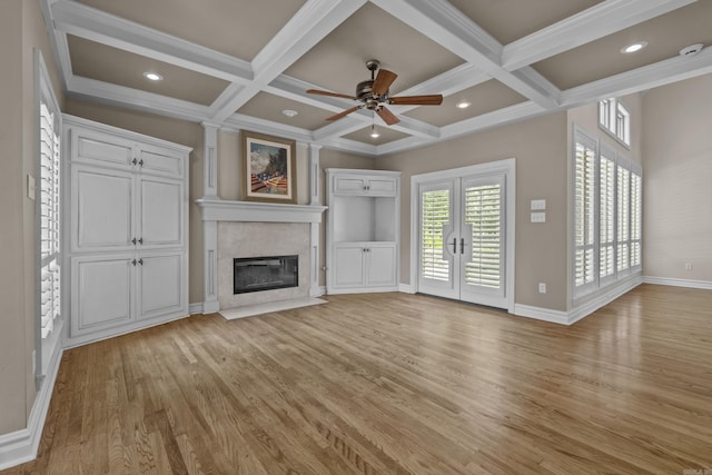 119 Marseille Dr, Maumelle, AR 72113 - unfurnished living room featuring baseboards, light wood-type flooring, a high end fireplace, a ceiling fan, and coffered ceiling