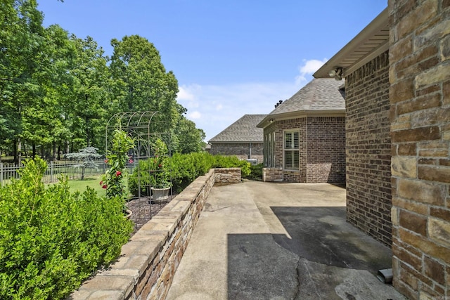 119 Marseille Dr, Maumelle, AR 72113 - view of patio with a garden