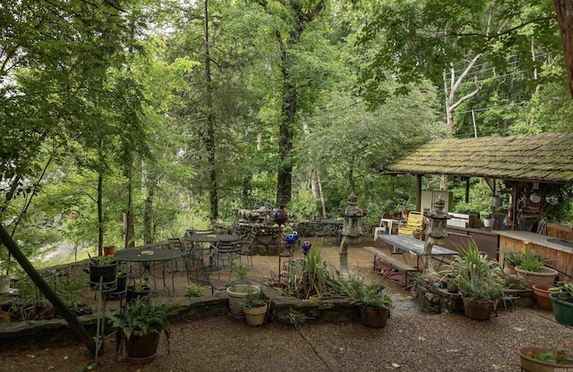 100 Rainbow Loop, Heber Springs, AR 72543 - view of patio with a gazebo and a wooded view