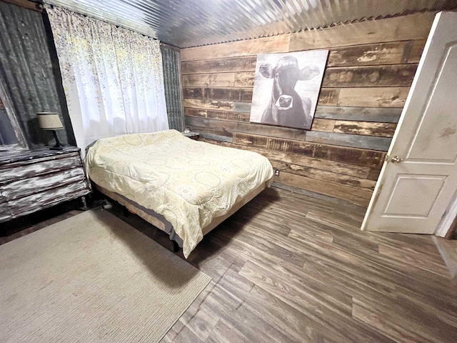 11 Fruitwood Ln, Glencoe, AR 72539 - bedroom featuring wooden walls and wood finished floors