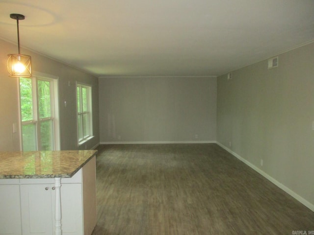 13 Cevico Ln, Hot Springs Village, AR 71909 - unfurnished living room with baseboards and dark wood-style flooring