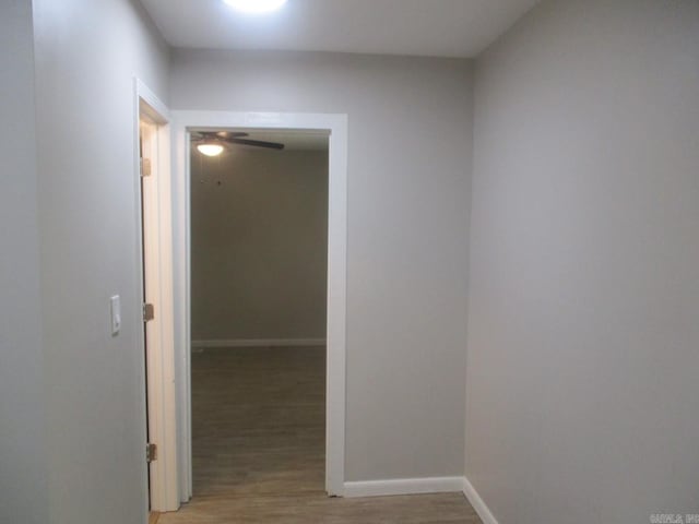 13 Cevico Ln, Hot Springs Village, AR 71909 - hallway featuring light wood-style floors and baseboards
