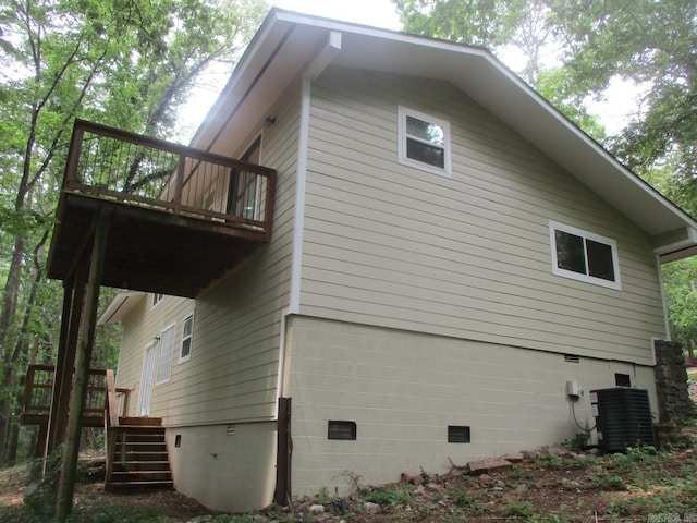 13 Cevico Ln, Hot Springs Village, AR 71909 - view of home's exterior featuring central AC, stairway, crawl space, and a deck