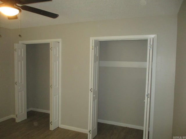 13 Cevico Ln, Hot Springs Village, AR 71909 - unfurnished bedroom featuring dark wood-type flooring, baseboards, and ceiling fan