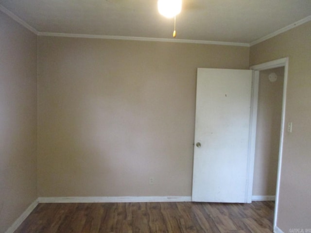 3908 S Hazel St, Pine Bluff, AR 71603 - unfurnished room featuring wood finished floors, ornamental molding, and baseboards