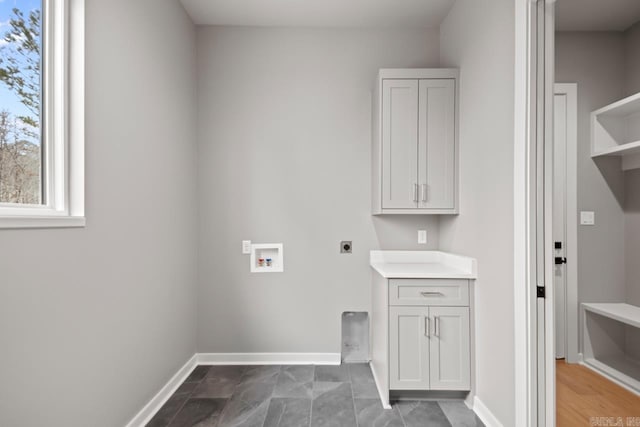22 Abington Ct, Little Rock, AR 72223 - laundry area with hookup for an electric dryer, washer hookup, baseboards, and cabinet space