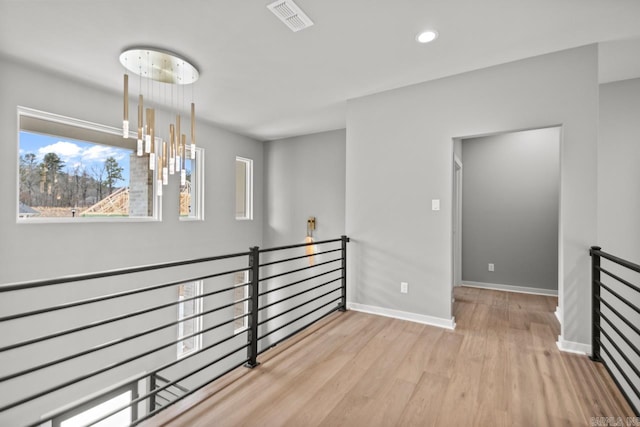 22 Abington Ct, Little Rock, AR 72223 - empty room featuring wood finished floors, plenty of natural light, baseboards, and recessed lighting