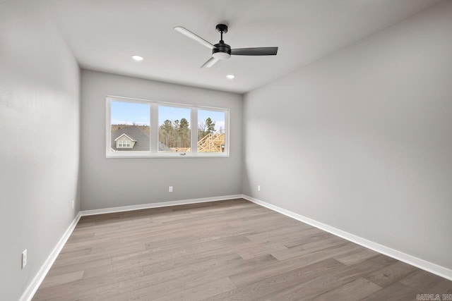 22 Abington Ct, Little Rock, AR 72223 - spare room featuring a ceiling fan, wood finished floors, recessed lighting, and baseboards