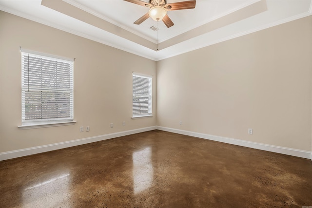 2820 Zion St, Little Rock, AR 72204 - unfurnished room featuring a tray ceiling, healthy amount of natural light, concrete flooring, a ceiling fan, and crown molding