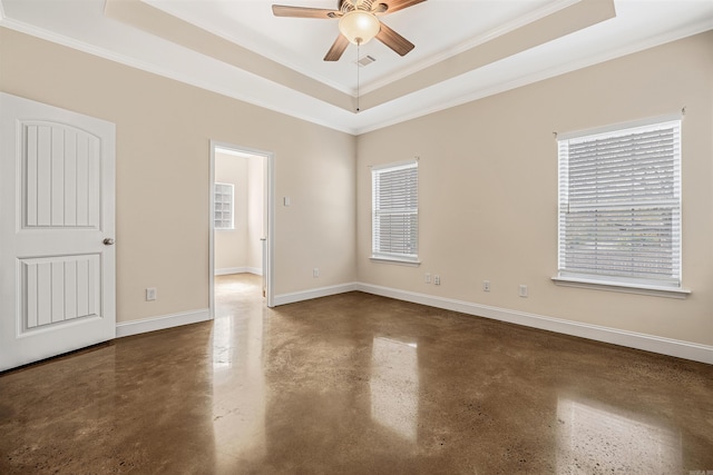 2820 Zion St, Little Rock, AR 72204 - spare room featuring a raised ceiling, ceiling fan, healthy amount of natural light, finished concrete floors, and ornamental molding