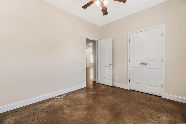 2820 Zion St, Little Rock, AR 72204 - unfurnished bedroom with concrete floors, baseboards, a closet, and ceiling fan