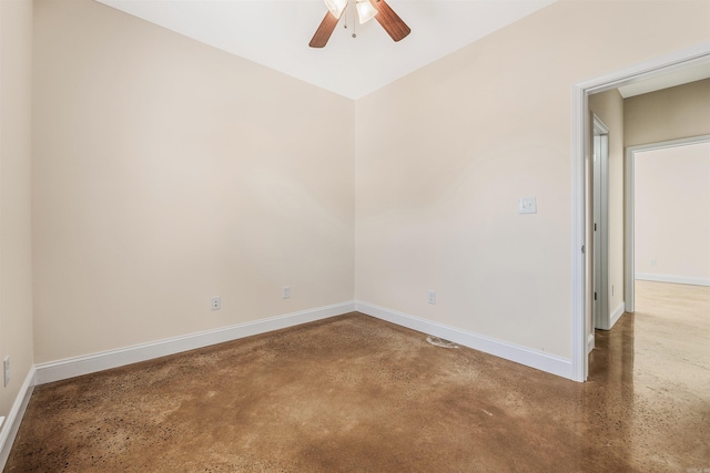 2820 Zion St, Little Rock, AR 72204 - empty room with finished concrete floors, a ceiling fan, and baseboards