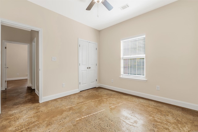 2820 Zion St, Little Rock, AR 72204 - unfurnished bedroom featuring concrete flooring, baseboards, and a closet