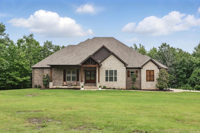 1045 Boulder Dr, Little Rock, AR 72210 - craftsman house featuring a front yard and brick siding
