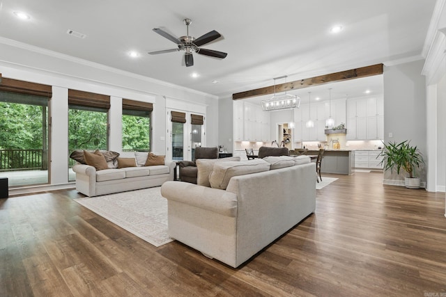 1045 Boulder Dr, Little Rock, AR 72210 - living area with a ceiling fan, ornamental molding, dark wood-style flooring, and recessed lighting