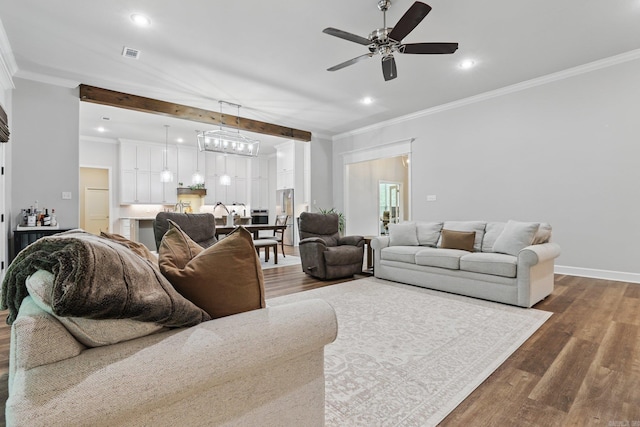 1045 Boulder Dr, Little Rock, AR 72210 - living area featuring dark wood-type flooring, a ceiling fan, crown molding, recessed lighting, and baseboards