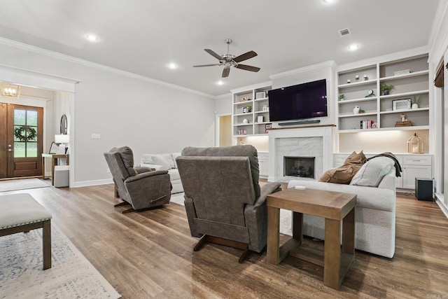 1045 Boulder Dr, Little Rock, AR 72210 - living area with wood finished floors, ornamental molding, baseboards, a ceiling fan, and recessed lighting