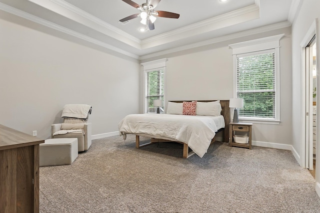 1045 Boulder Dr, Little Rock, AR 72210 - carpeted bedroom featuring a tray ceiling, baseboards, crown molding, recessed lighting, and ceiling fan