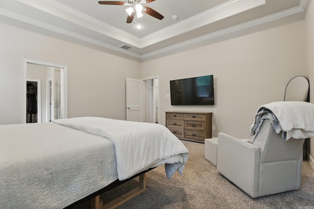 1045 Boulder Dr, Little Rock, AR 72210 - bedroom featuring light colored carpet, crown molding, a raised ceiling, and a ceiling fan