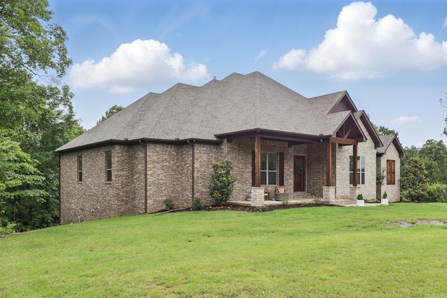 1045 Boulder Dr, Little Rock, AR 72210 - view of front of property with a front yard, covered porch, and brick siding