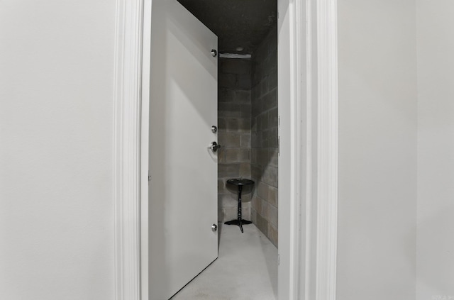 1045 Boulder Dr, Little Rock, AR 72210 - bathroom with tiled shower and concrete flooring