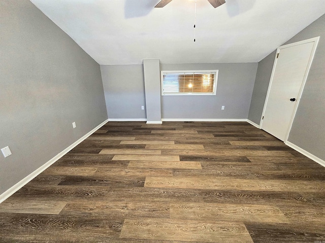 2715 Greenbriar Dr Apt B, Jonesboro, AR 72401 - empty room with a ceiling fan, vaulted ceiling, wood finished floors, and baseboards