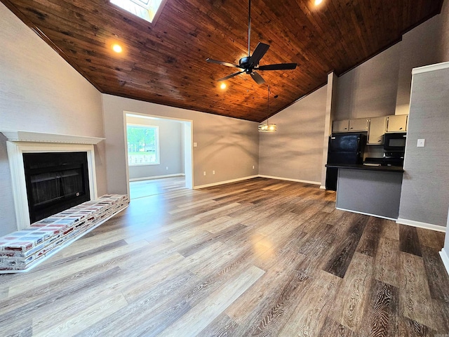 2715 Greenbriar Dr Apt B, Jonesboro, AR 72401 - unfurnished living room featuring wooden ceiling, baseboards, a ceiling fan, dark wood-style flooring, and a fireplace