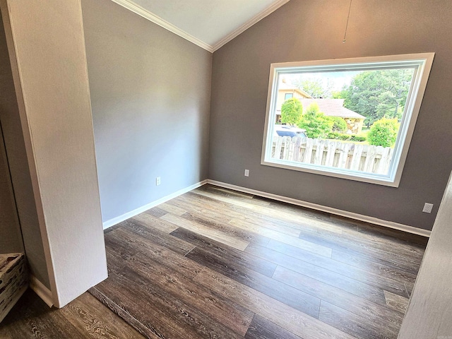 2715 Greenbriar Dr Apt B, Jonesboro, AR 72401 - empty room featuring lofted ceiling, ornamental molding, wood finished floors, and baseboards