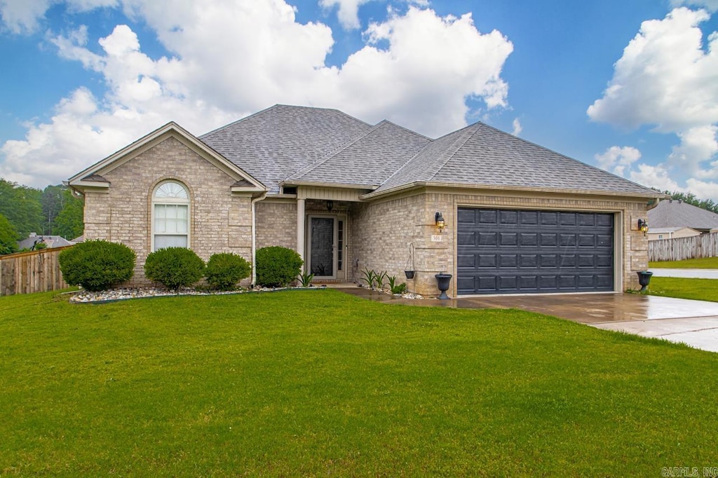 301 Merril Dr, Benton, AR 72015 - view of front of property with roof with shingles, an attached garage, concrete driveway, and brick siding
