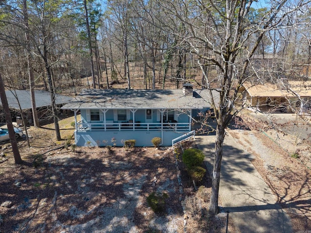 32 S Pego Way, Hot Springs Village, AR 71909 - single story home featuring a porch and a chimney