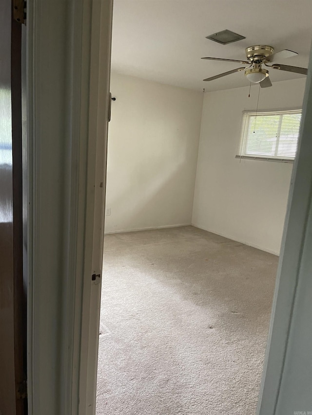 16 Southmont Dr, Little Rock, AR 72209 - carpeted empty room featuring a ceiling fan